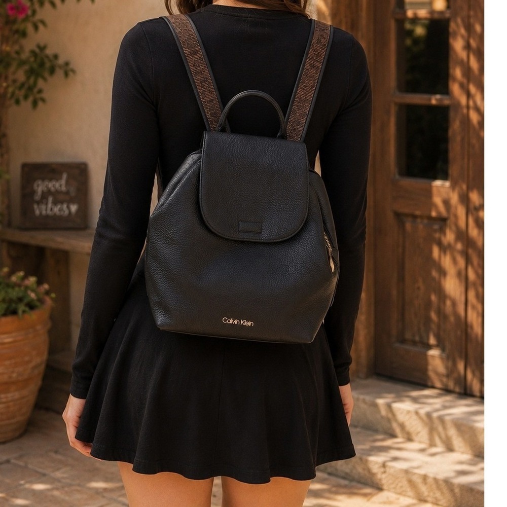 Calvin Klein Black Pebbled Leather Flap Backpack with Logo Webbed Straps